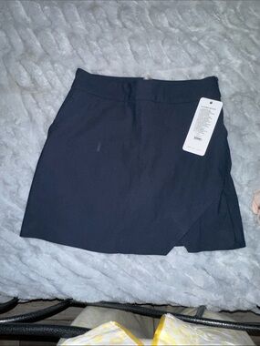 RHONE Black Women's Athletic Skort with Overlap Front
